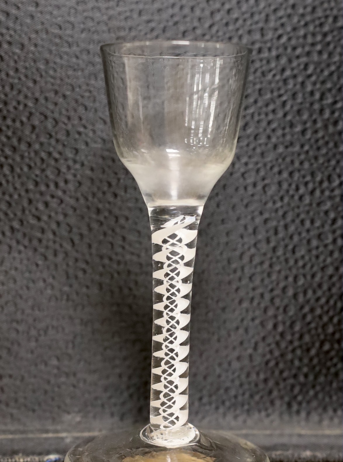 Two 18th century double series opaque twist stem cordial glasses, 14cm tall